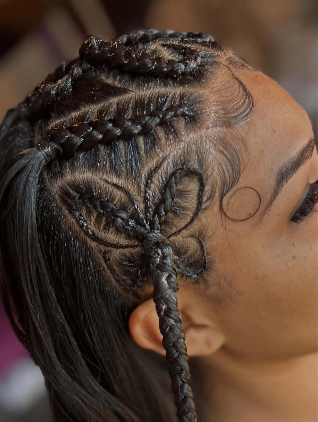 butterfly braids hairstyle Minimalist Butterfly Scalp Art with Sleek Ponytail
