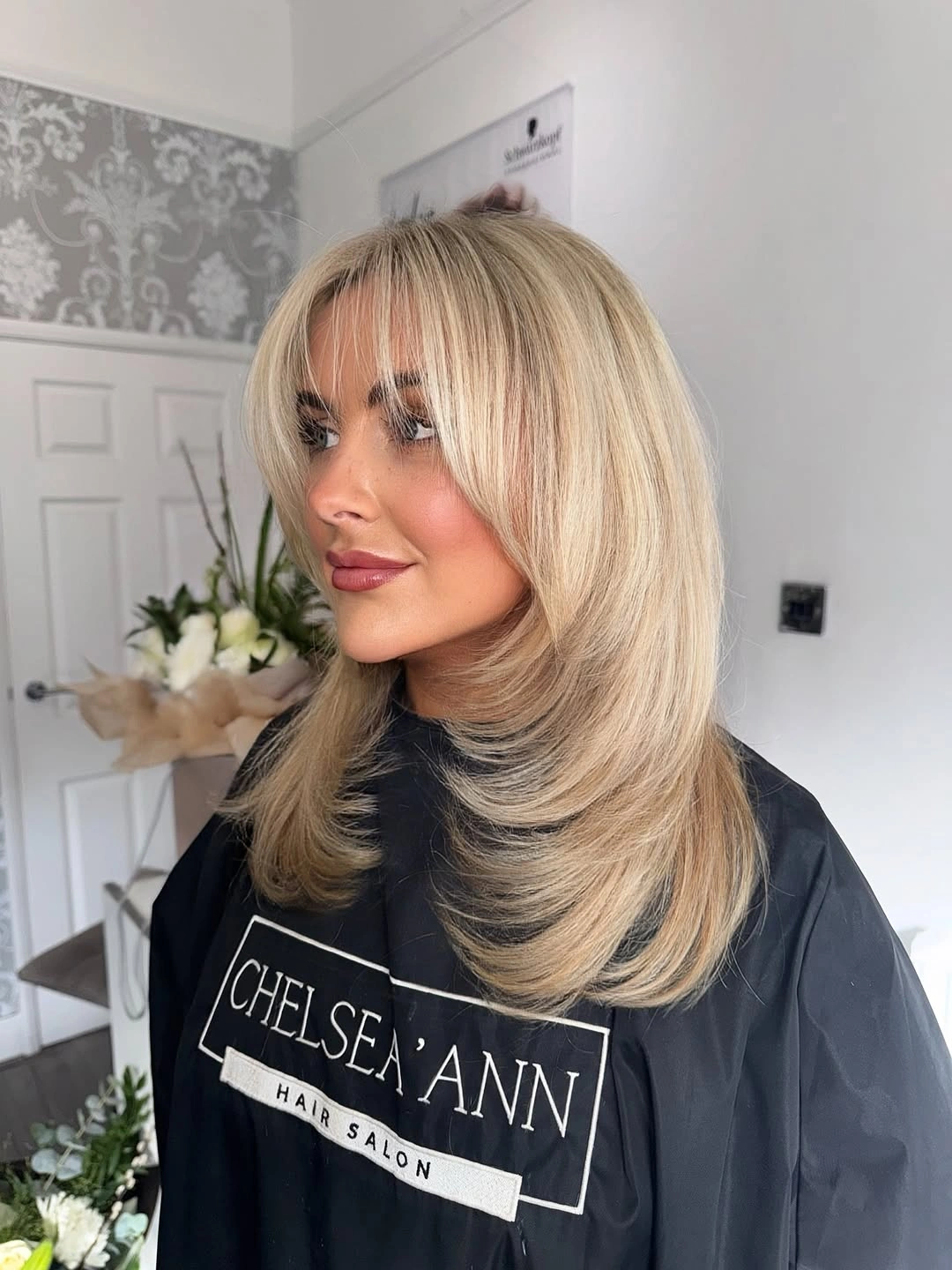 choppy medium layered hair Champagne Blonde Layers with Soft Curtain Bangs