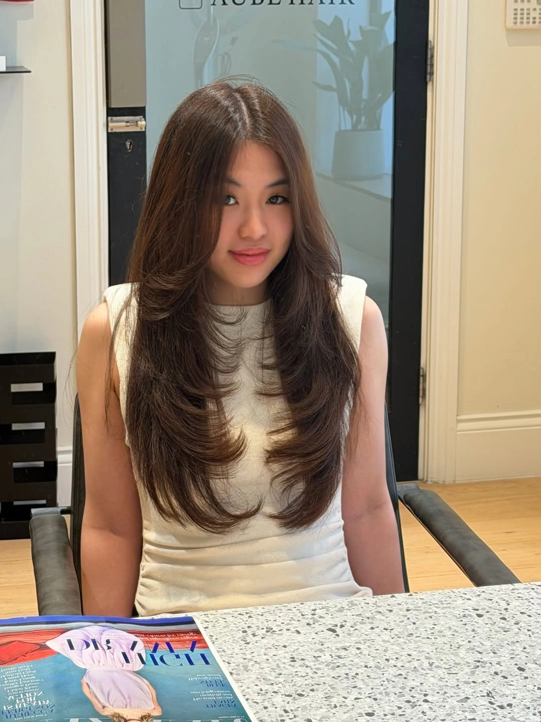 choppy medium layered hair Soft Espresso Layers with a Center-Part Frame