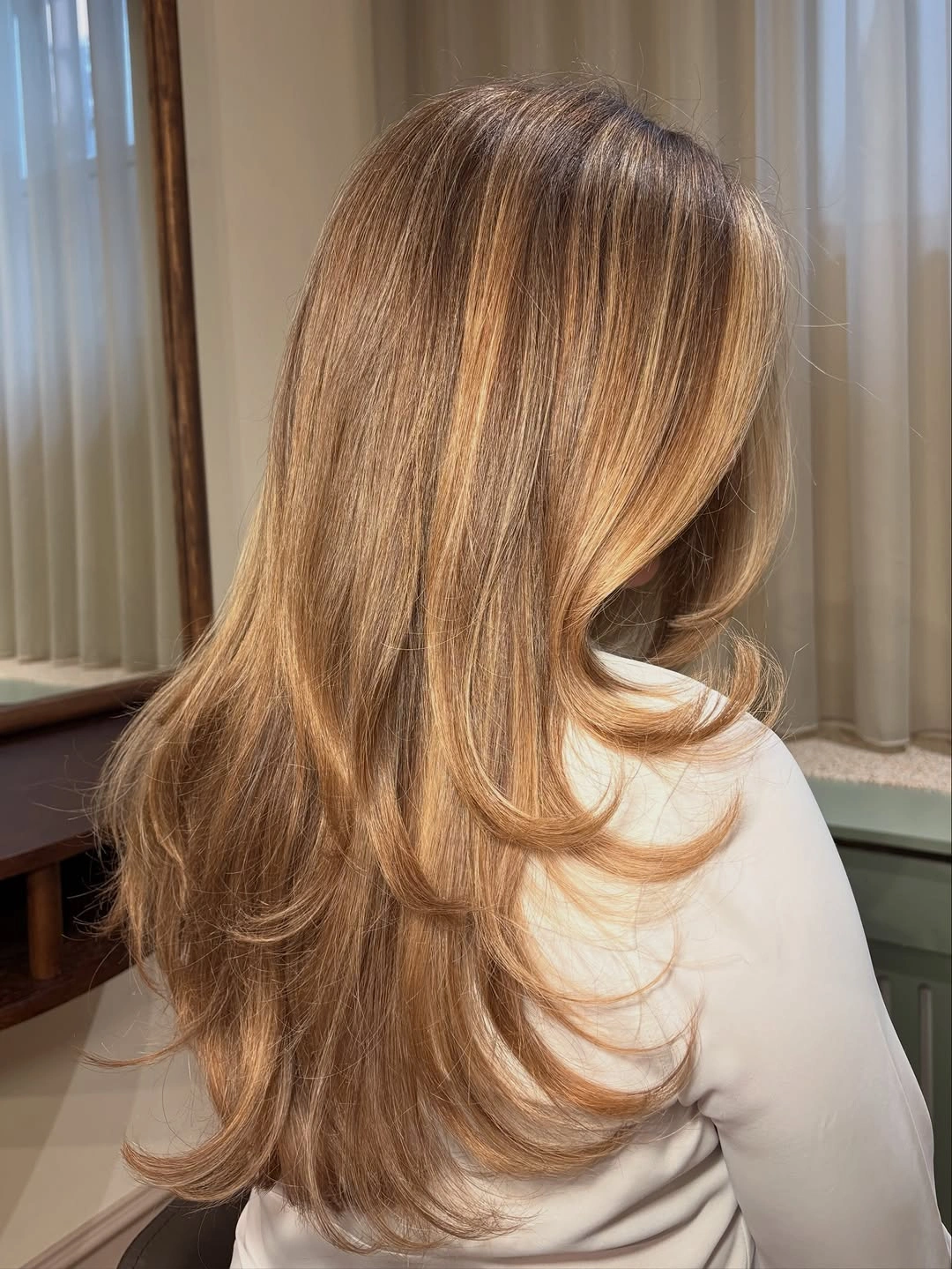 choppy medium layered hair Honey Blonde Face-Framing Layers with Polished Ends