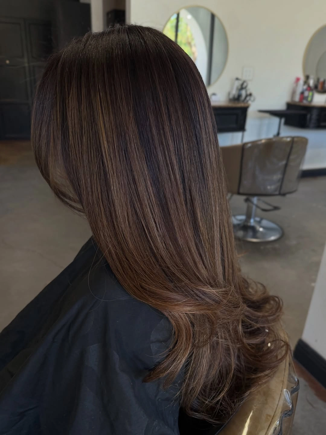 dimensional brunette hair color Warm Cocoa Brunette with Feathered Luxury Layers