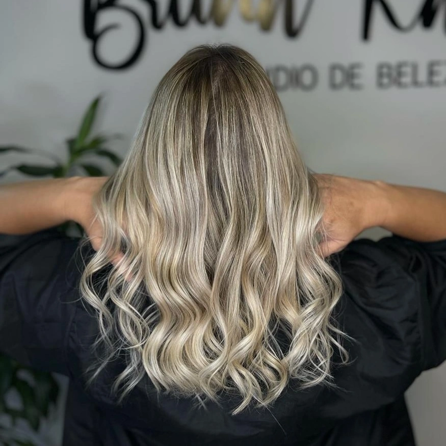 dirty blonde hair color Smoky Dirty Blonde Lob With Soft Pearl Dimension