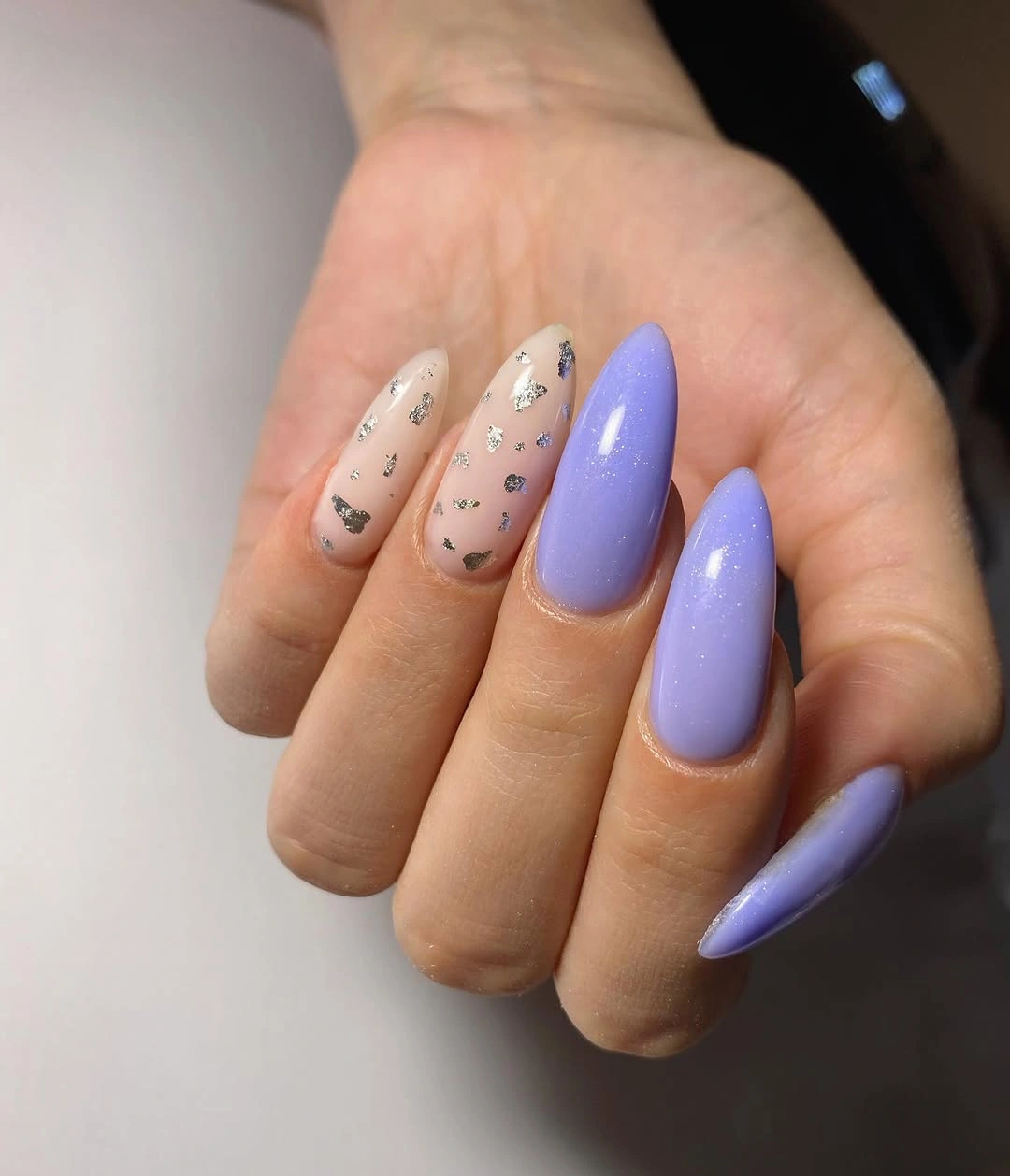 lavender almond nails with silver fleck accents