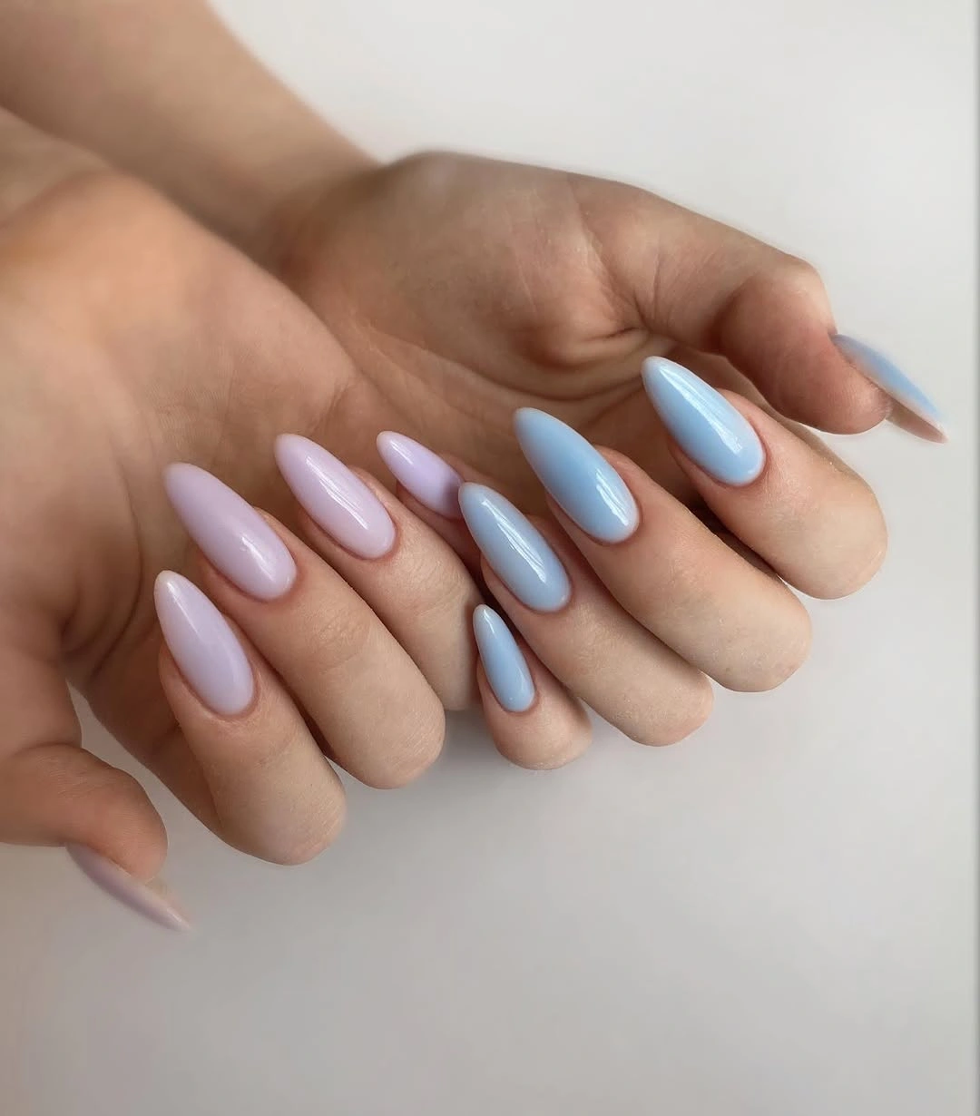 pastel pink and blue glossy almond nails