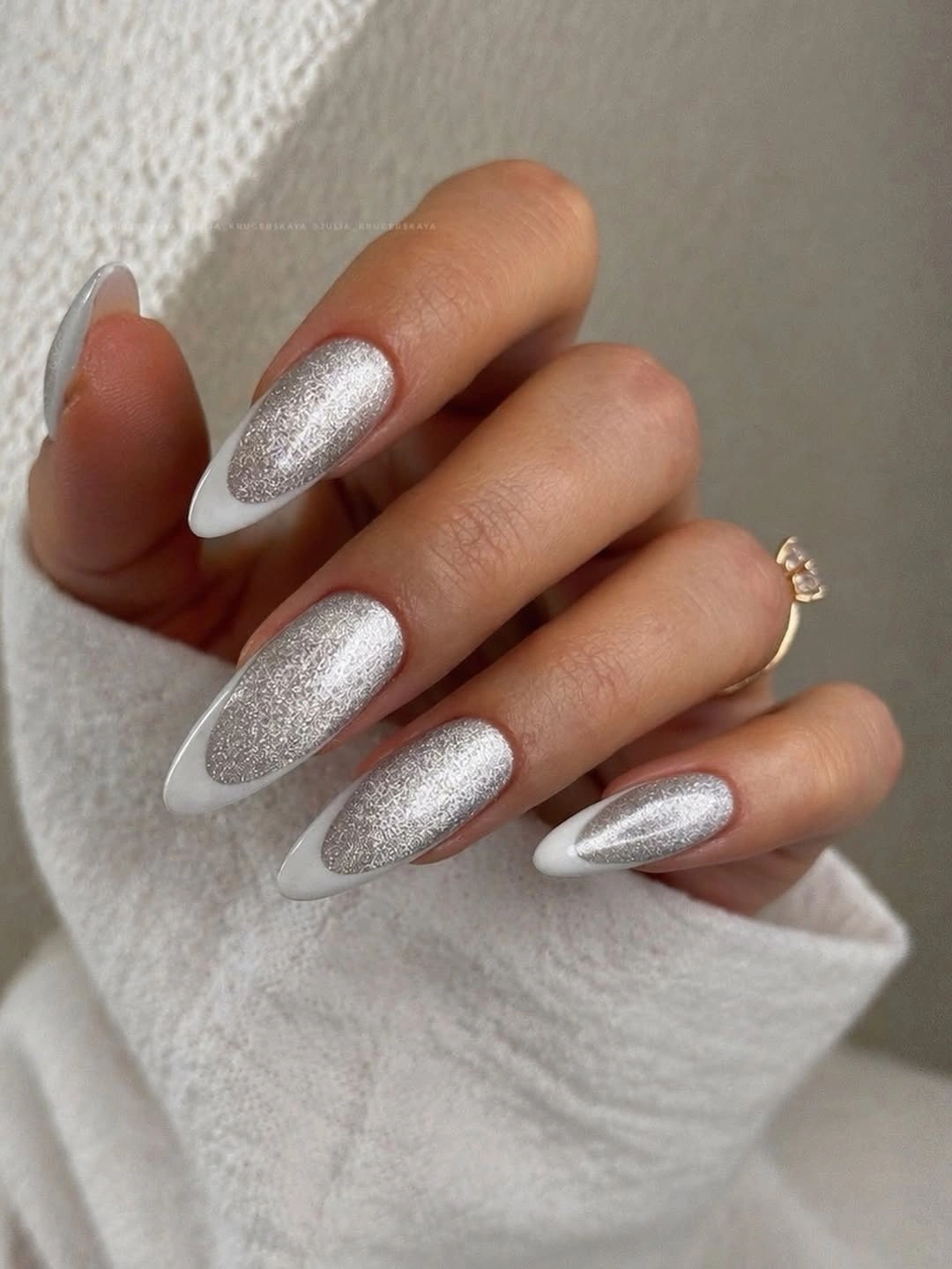 silver center almond nails with white framing