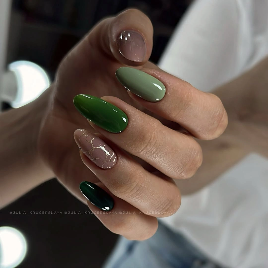 green almond nails with fine gold crackle accents