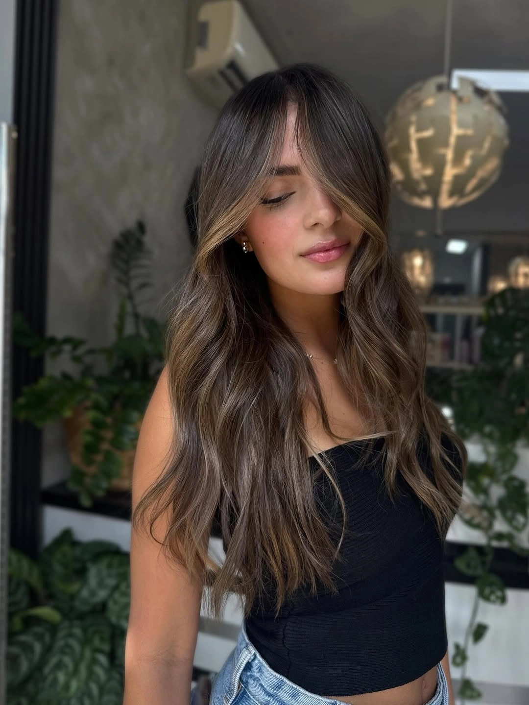 Fall brunette hair colour 2026 Cool Mocha Balayage with Airy Curtain Bangs