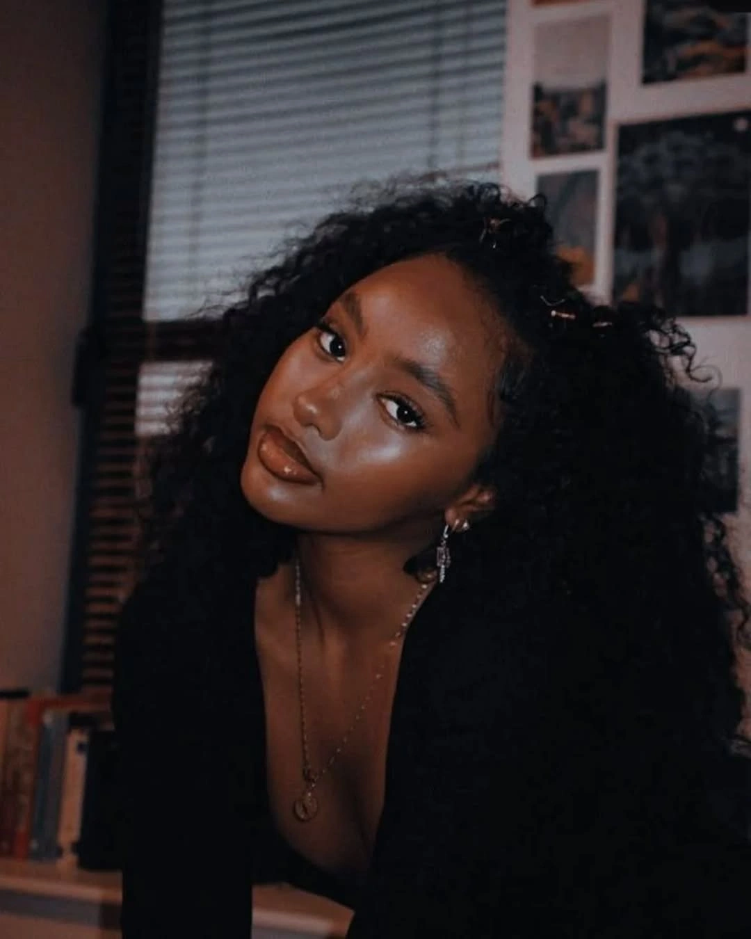 fall hair colors for black women 2026 Midnight Black Curls With Soft Romantic Volume