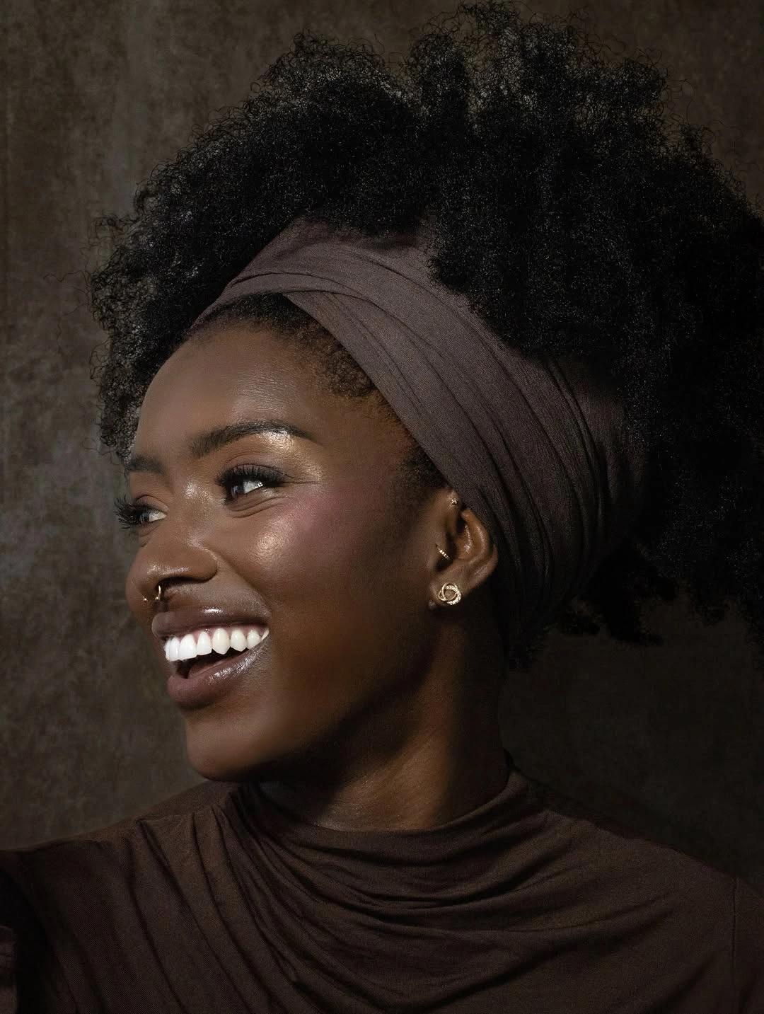 fall hair colors for black women 2026 Soft Protective Puff With Elegant Natural Texture