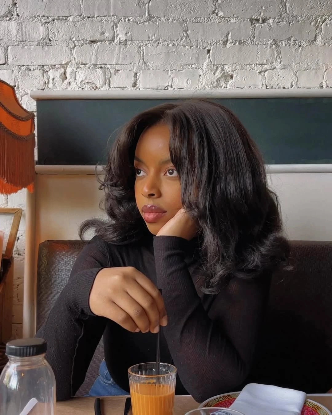 fall hair colors for black women 2026 Soft Espresso Blowout With Timeless Bounce
