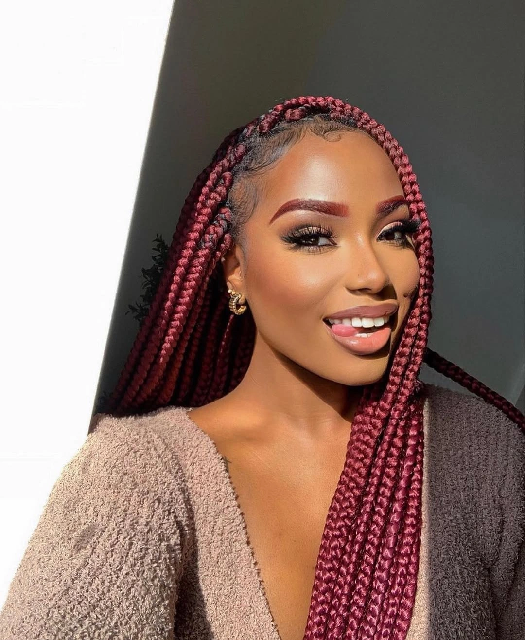 fall hair colors for black women 2026 Rich Burgundy Box Braids for a Cozy Autumn Refresh