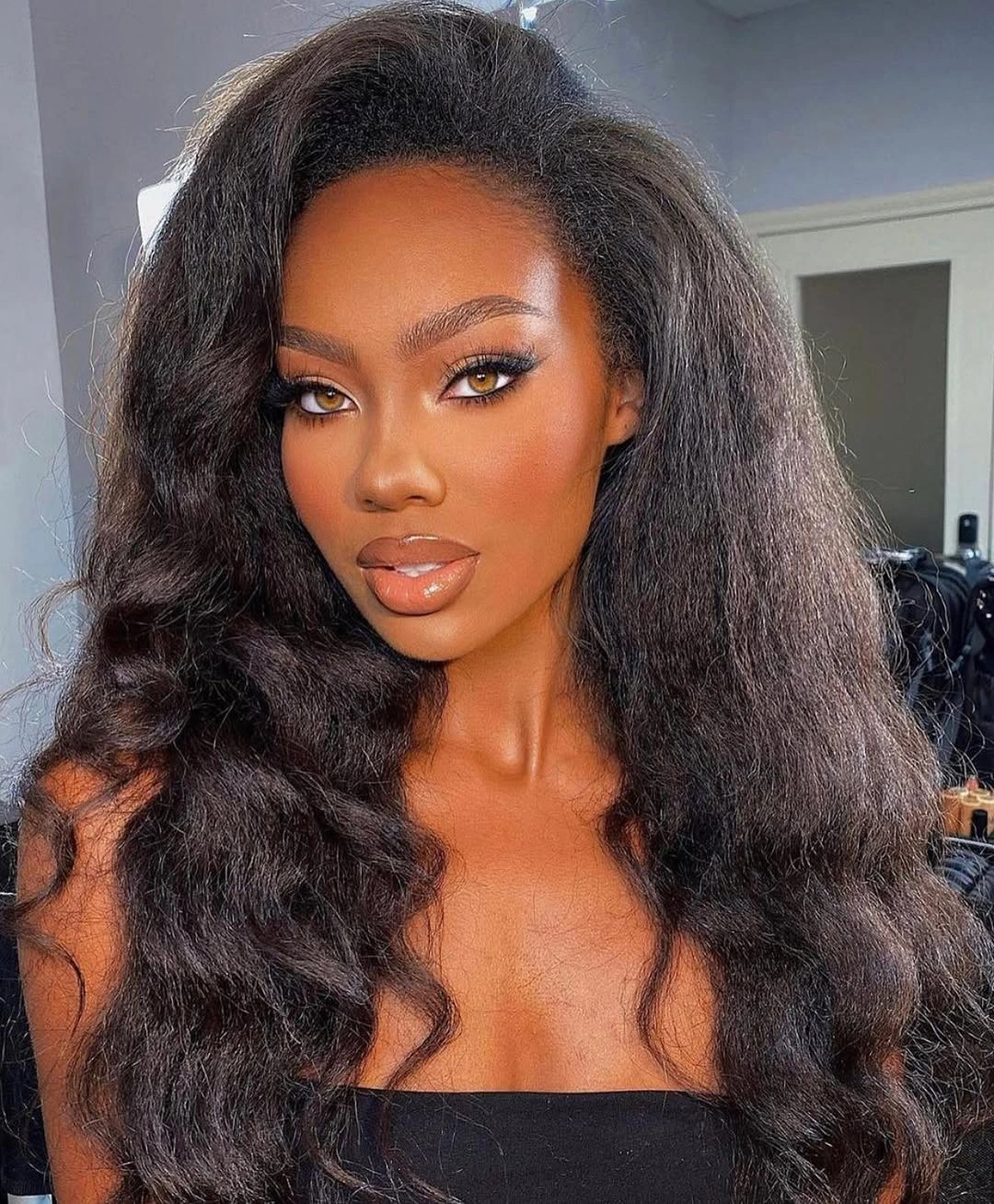 fall hair colors for black women 2026 Velvet Black Waves With Luxurious Shine