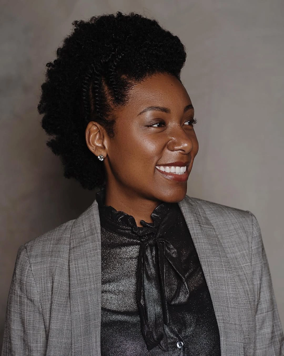 fall hair colors for black women 2026 Elegant Natural Updo With Rich Ebony Depth
