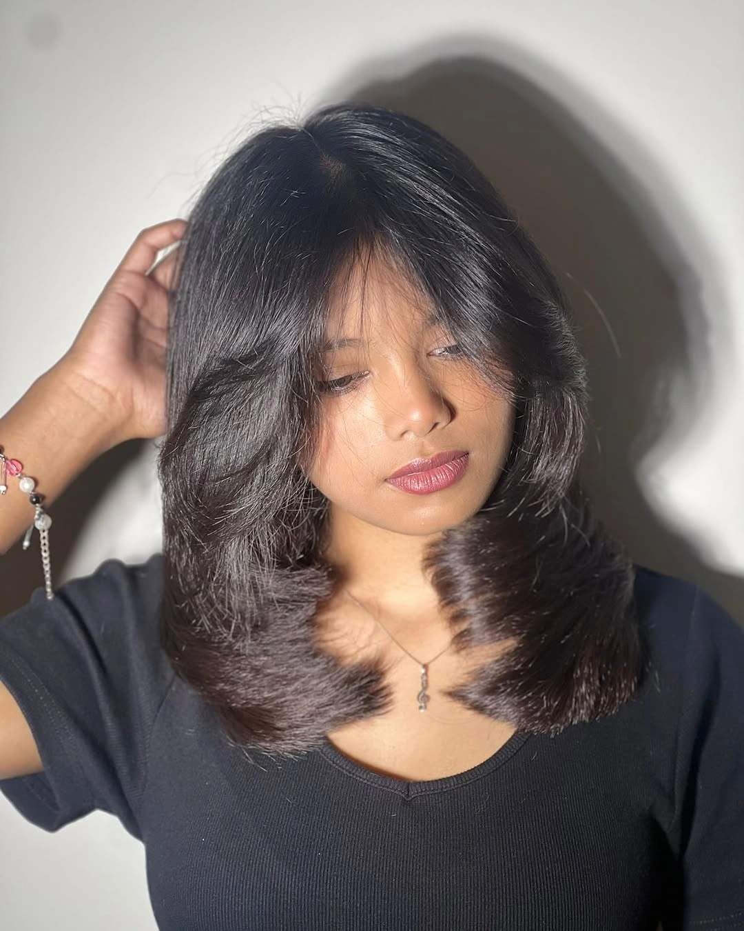 fall haircuts for women 2026 Soft Butterfly Layers With Wispy Curtain Bangs