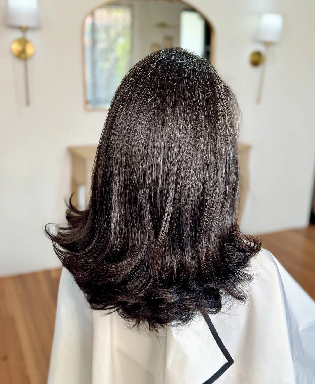 fall haircuts for women 2026 Glossy Flip Layers With Elegant Rounded Ends