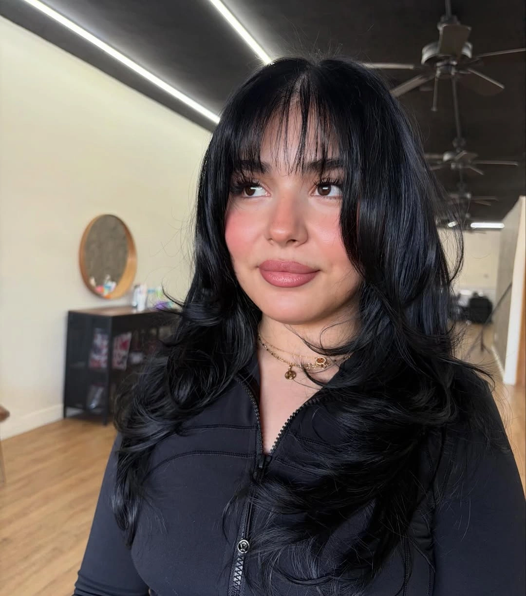 fall haircuts for women 2026 Jet Black Layers With Full Fringe