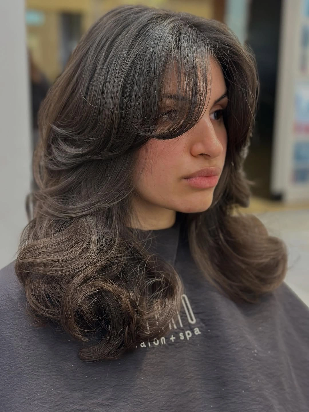 fall haircuts for women 2026 Soft Espresso Layers With Airy Curtain Fringe