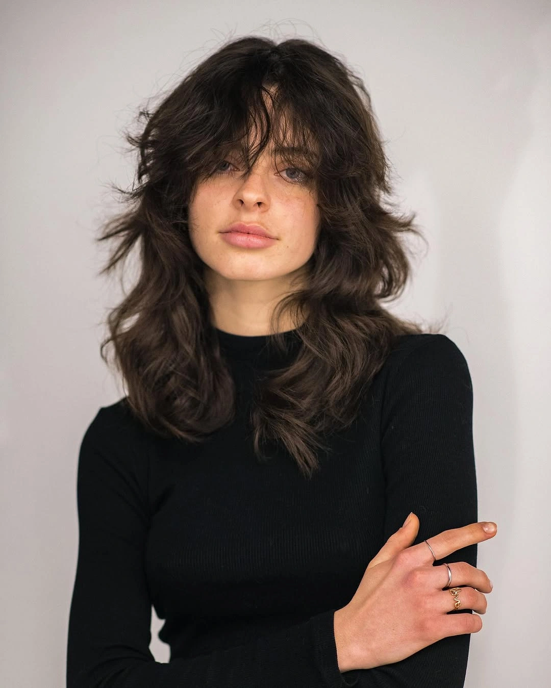 fall haircuts for women 2026 Modern Shag With Wispy Curtain Bangs