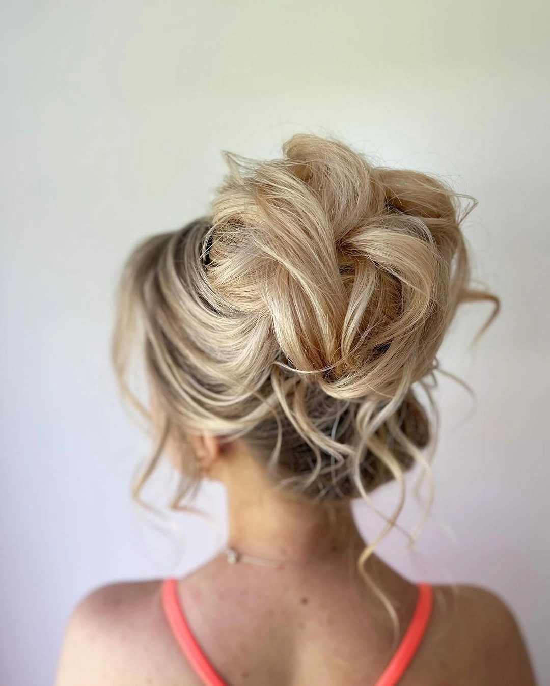 fall hairstyles 2026 Relaxed Textured Updo with Soft Romantic Volume