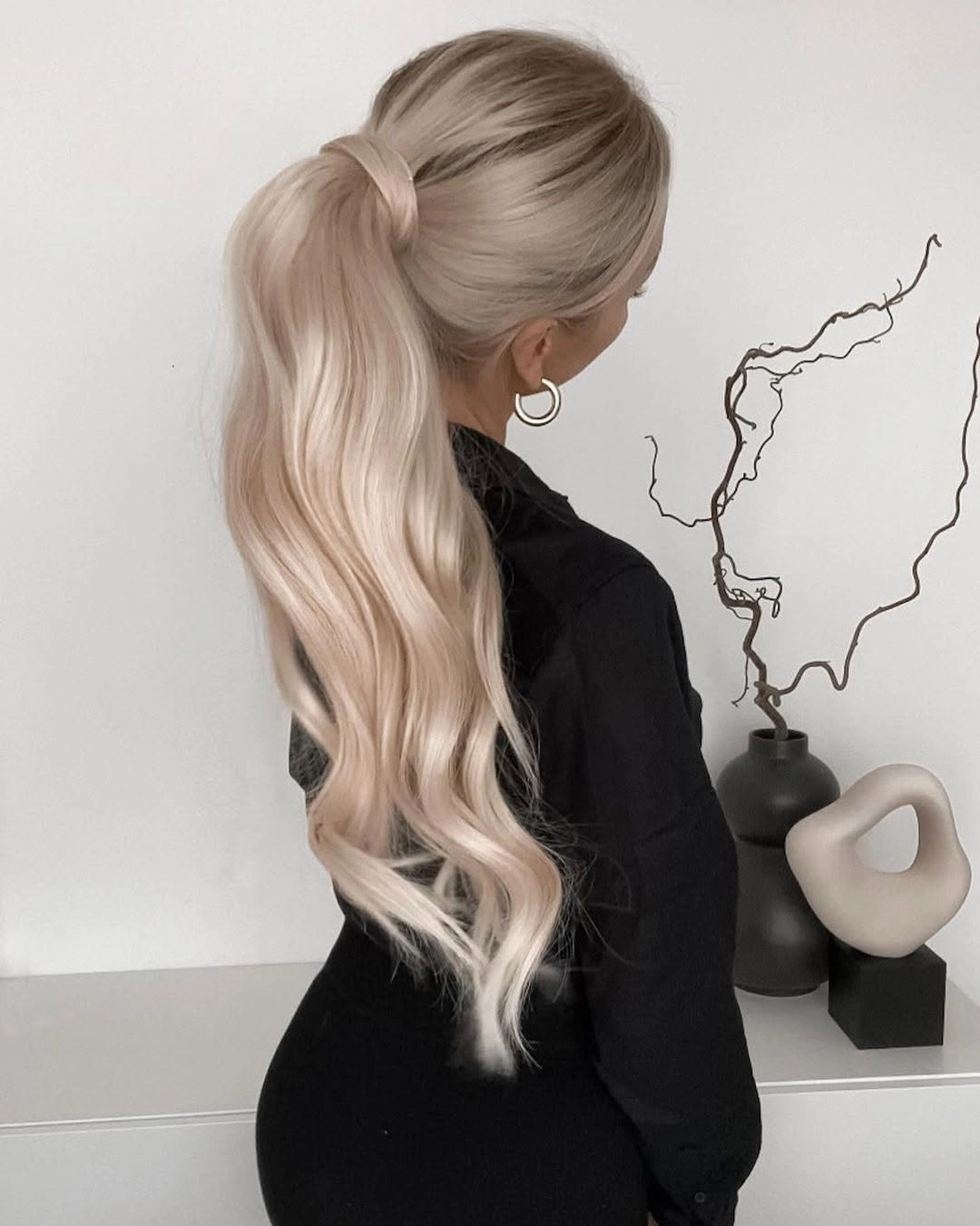 fall hairstyles for long hair 2026 Polished High Blonde Ponytail with Cascading Waves