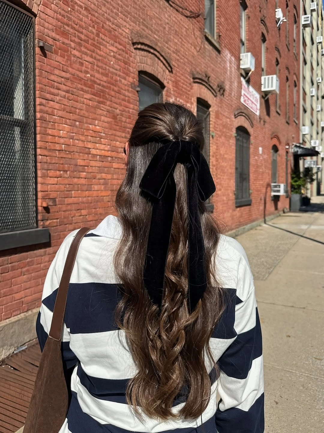 fall hairstyles for long hair 2026 Elegant Half-Up Waves with a Velvet Bow
