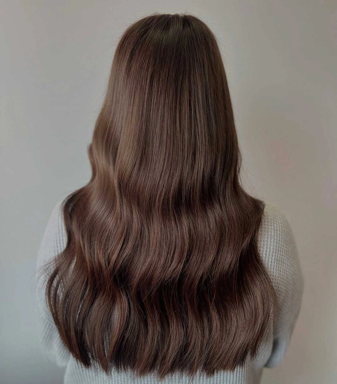fall hairstyles for long hair 2026 Glossy Cocoa Waves with Minimalist Finish