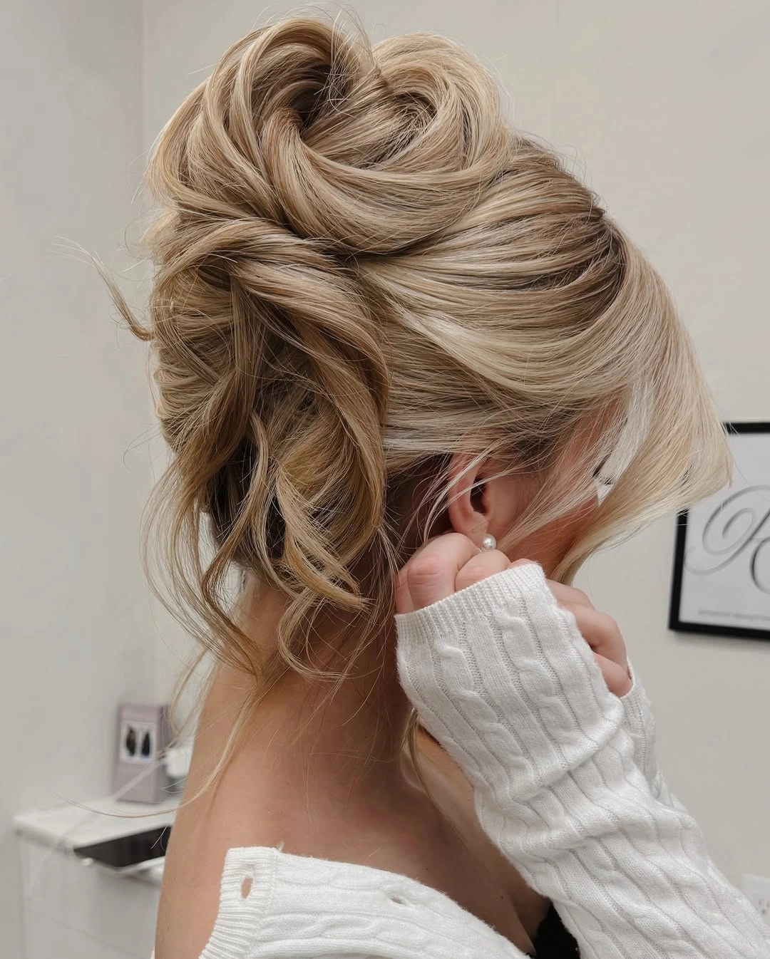 Fall hairstyles for office 2026 Romantic Twisted Blonde Updo with Soft Curtain Pieces