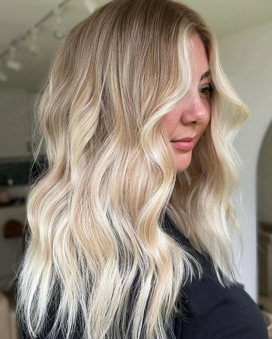 Fall hairstyles for office 2026 Modern Blonde Waves for Effortless Professional Style