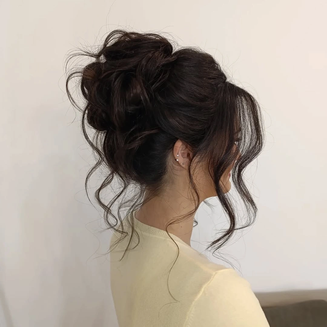 Fall hairstyles for office 2026 Soft Curly Office Updo with Romantic Volume