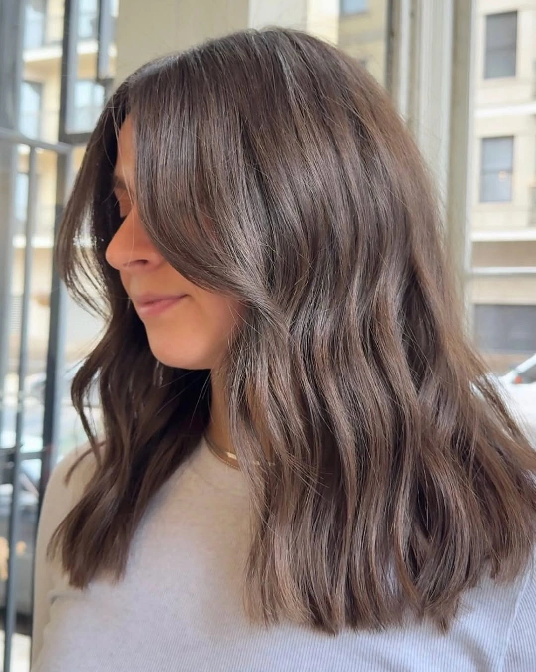 Fall hairstyles for office 2026 Soft Espresso Waves with Curtain Fringe