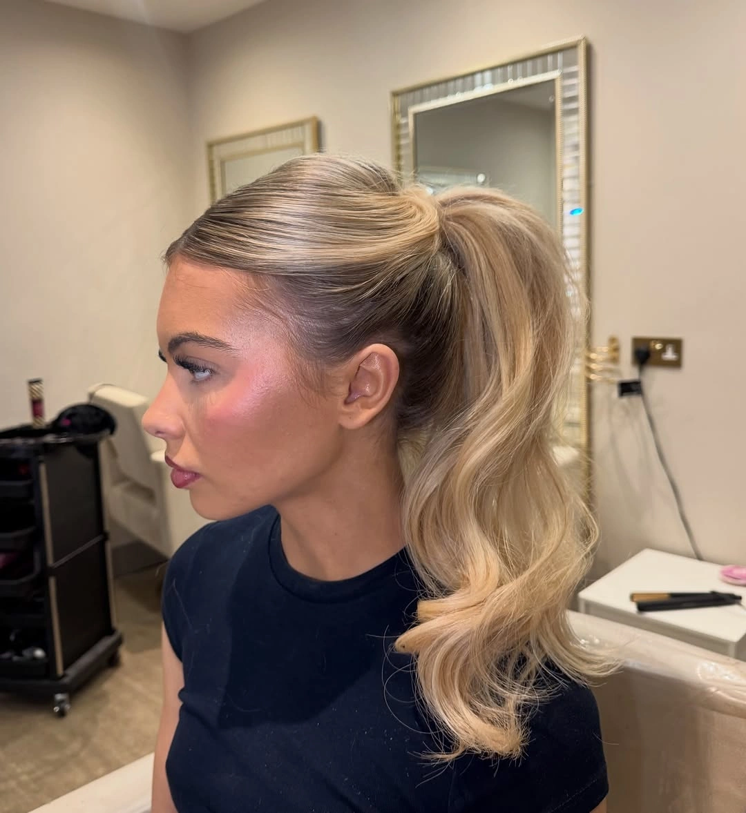 Fall hairstyles for office 2026 Voluminous High Ponytail with Smooth Siren Finish