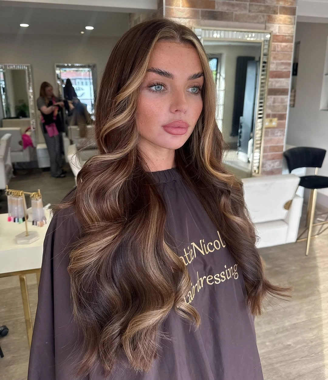 Fall hairstyles for office 2026 Luxury Brunette Blowout with Face-Framing Highlights