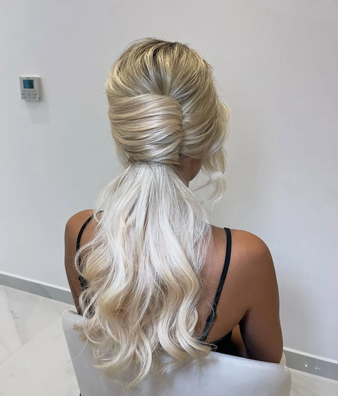 Fall hairstyles for office 2026 Wrapped Half-Up Ponytail with Soft Platinum Waves