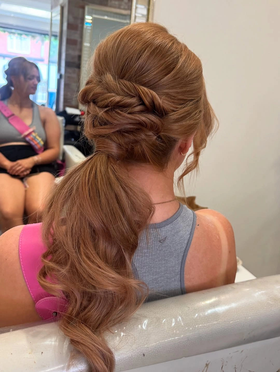 Fall hairstyles for office 2026 Twisted Low Ponytail with Soft Copper Dimension