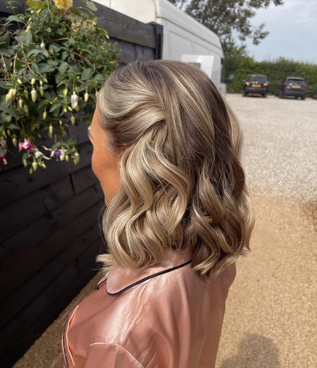 Fall hairstyles for short hair 2026 Loose Glamorous Waves with a Twisted Half-Up Finish