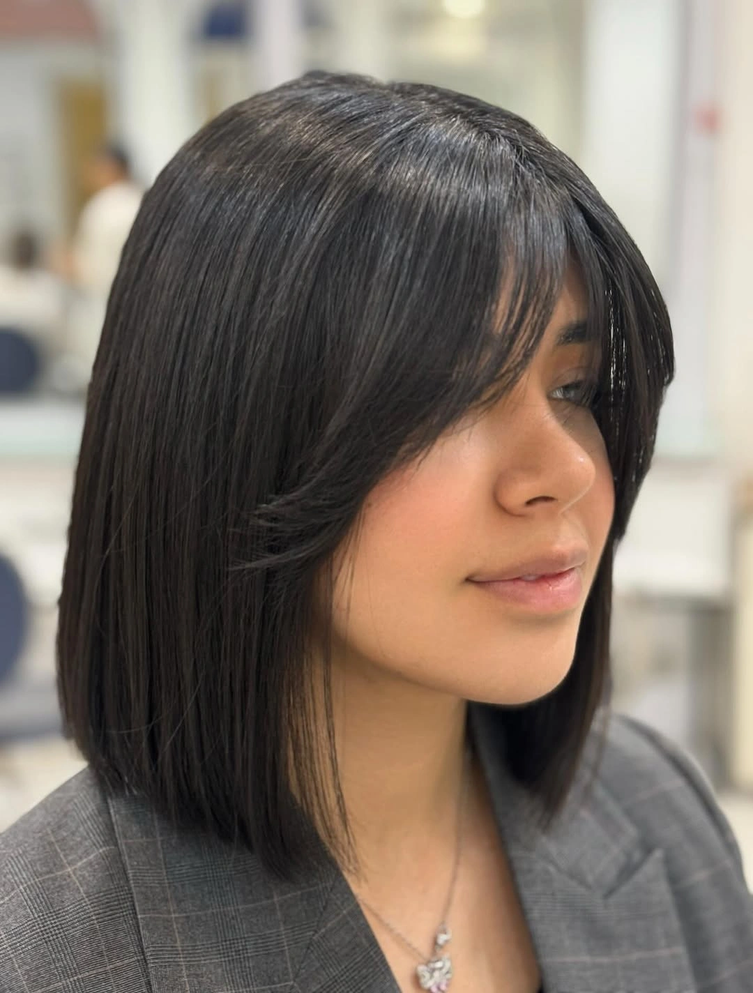 Fall hairstyles for short hair 2026 Glossy Italian Bob with Long Curtain Fringe