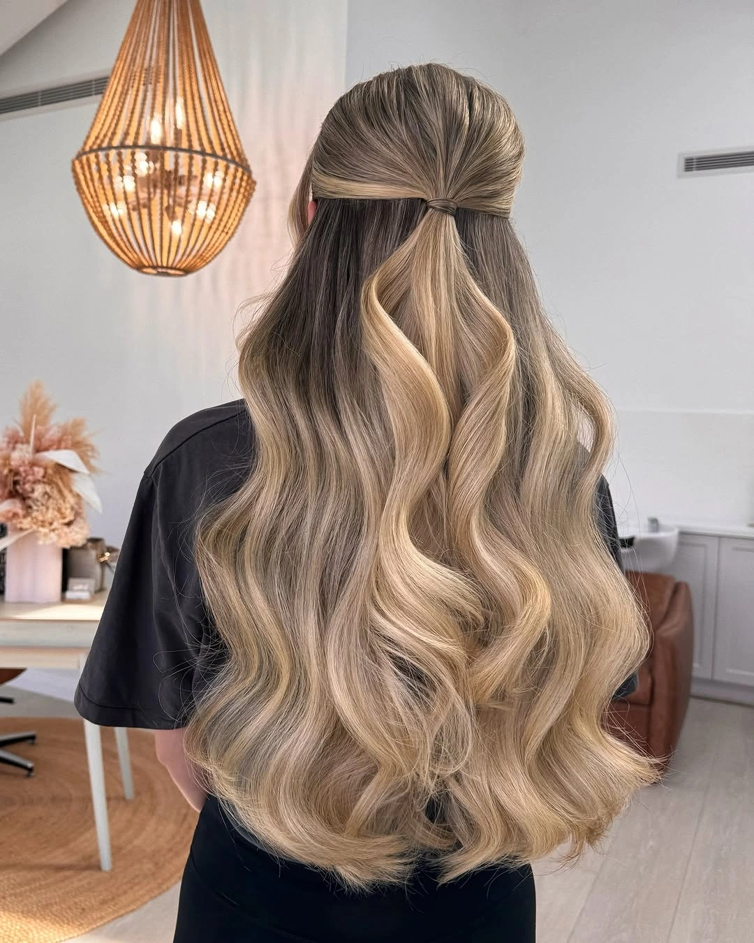 Fall hairstyles for wedding guests 2026 Soft Half-Up Waves with Dimensional Blonde Balayage