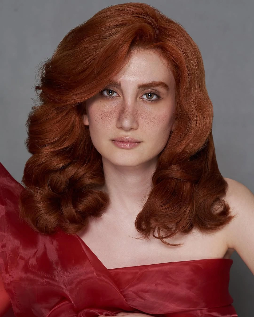 Fall hairstyles for wedding guests 2026 Voluminous Copper Glamour with Vintage-Inspired Layers