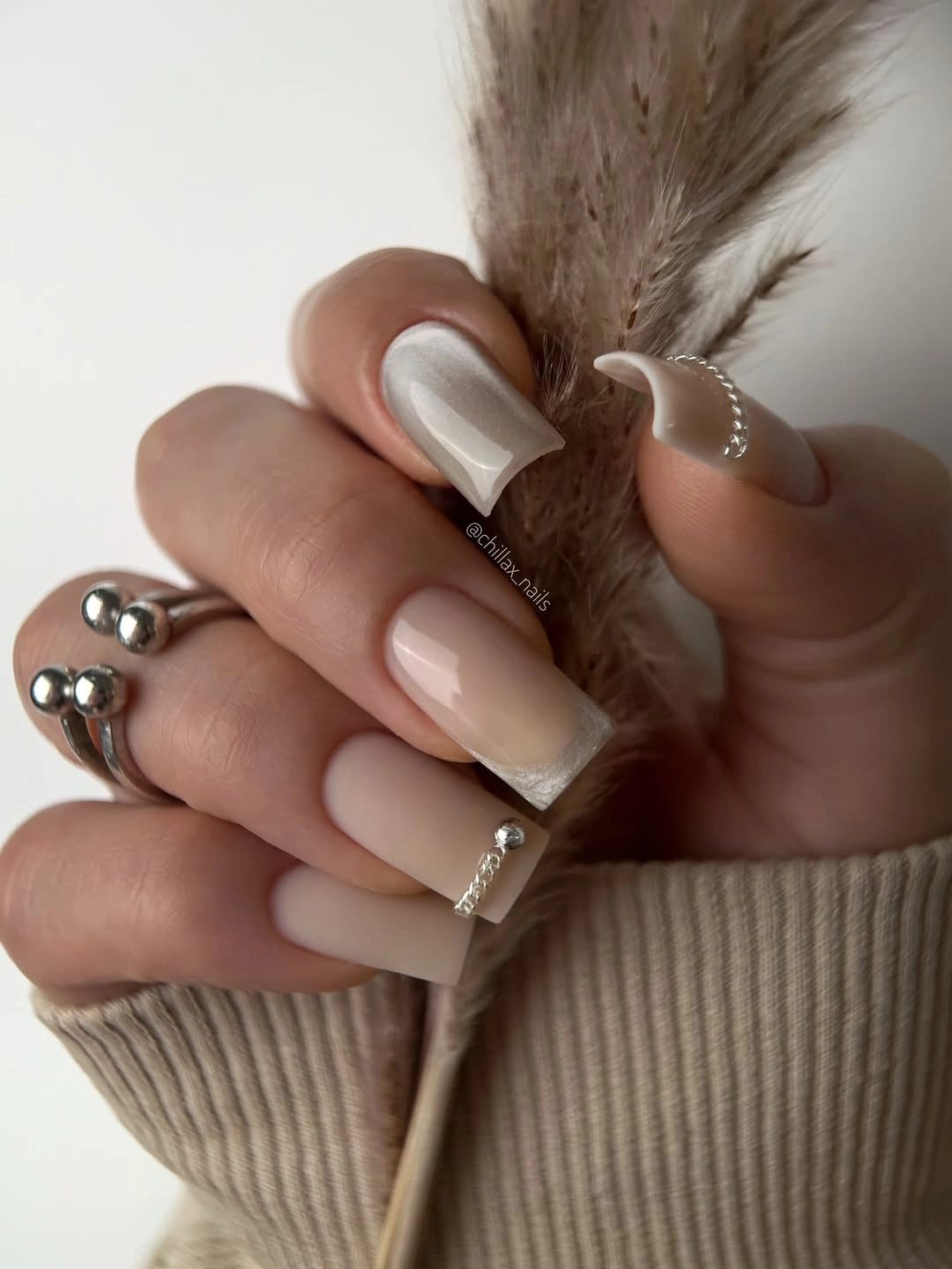 pearly white and nude nails with soft rounded square tips