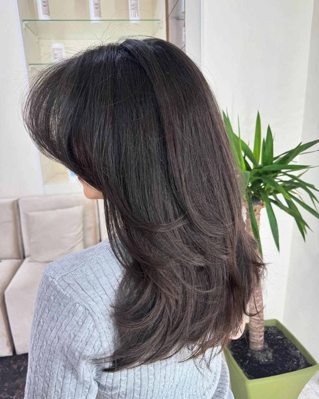 fall medium haircuts 2026 Feathered Layers With Dramatic Curtain Volume