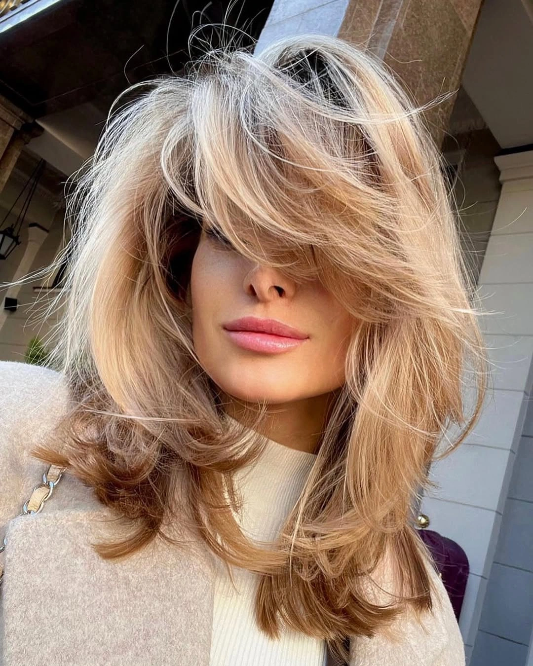 fall medium haircuts 2026 Airy Butterfly Layers With Bold Curtain Bangs