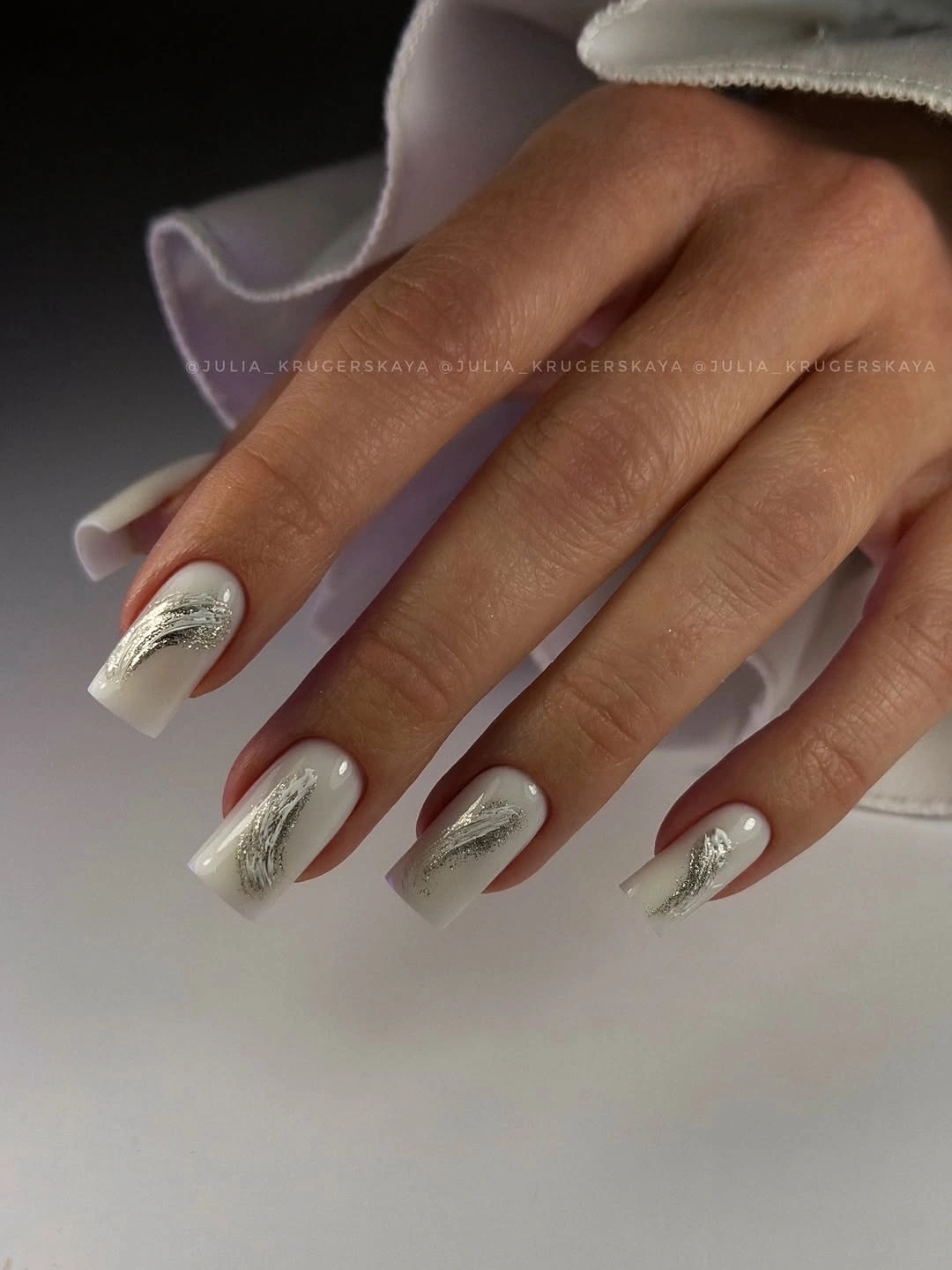 White square nails with silver glitter brush strokes