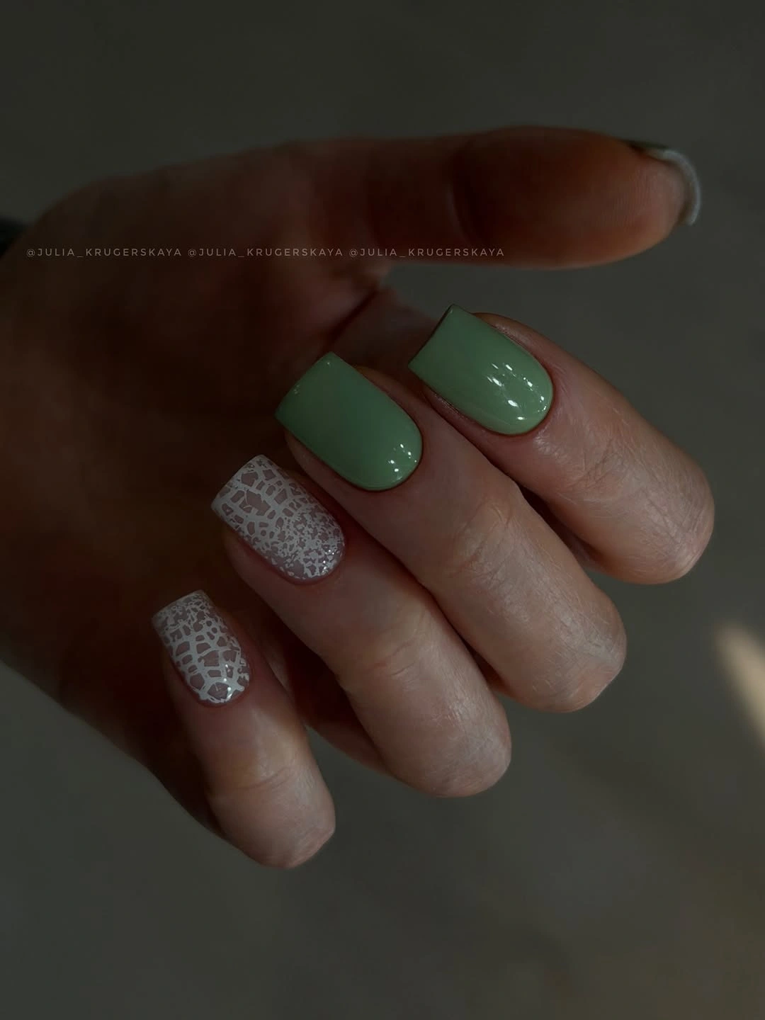 Sage green square nails with cracked white accent nails