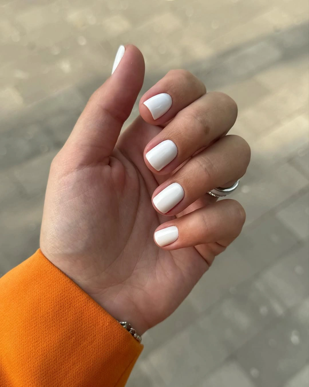 Clean white short nails with rounded square corners