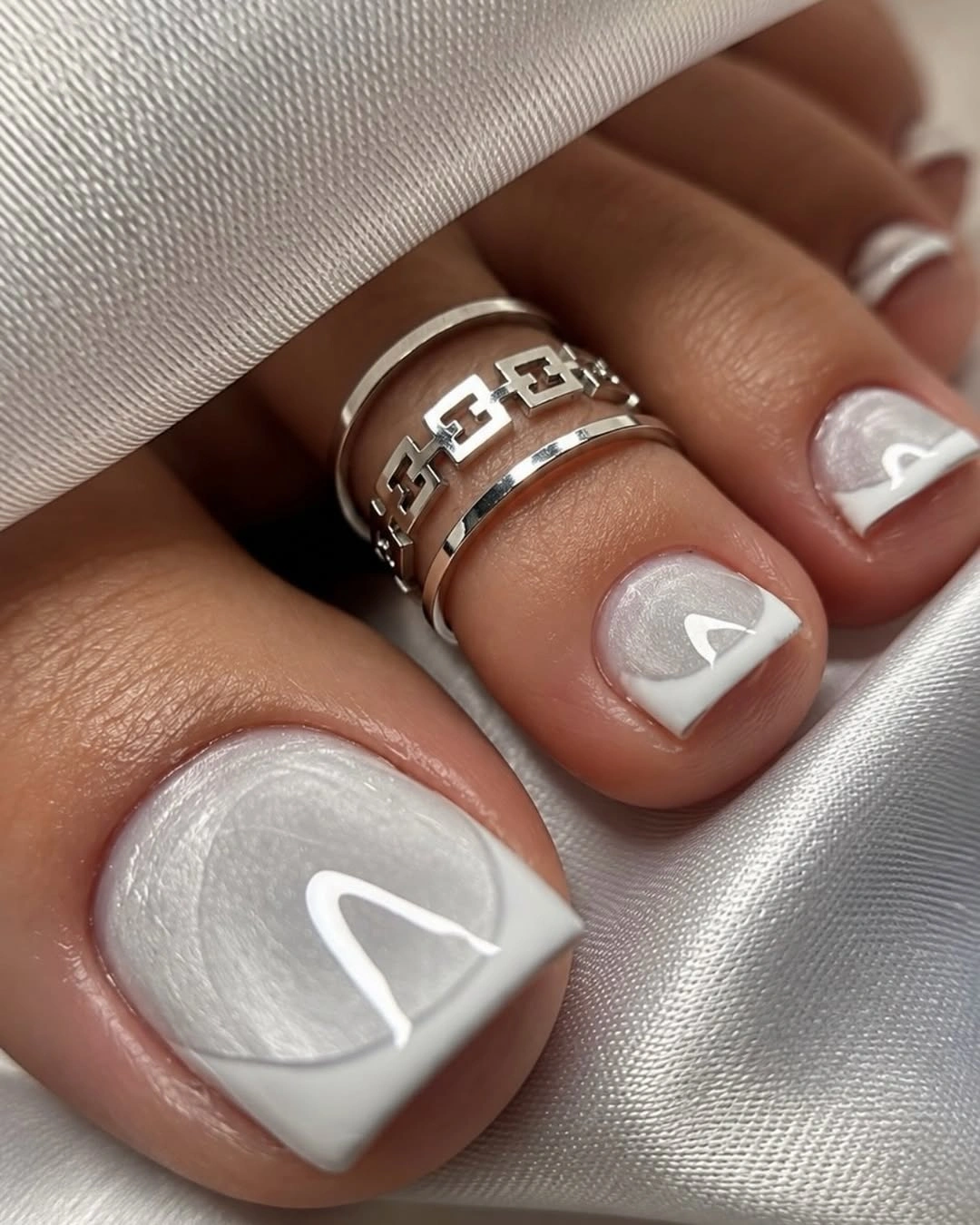 pearly white French tips on short toenails