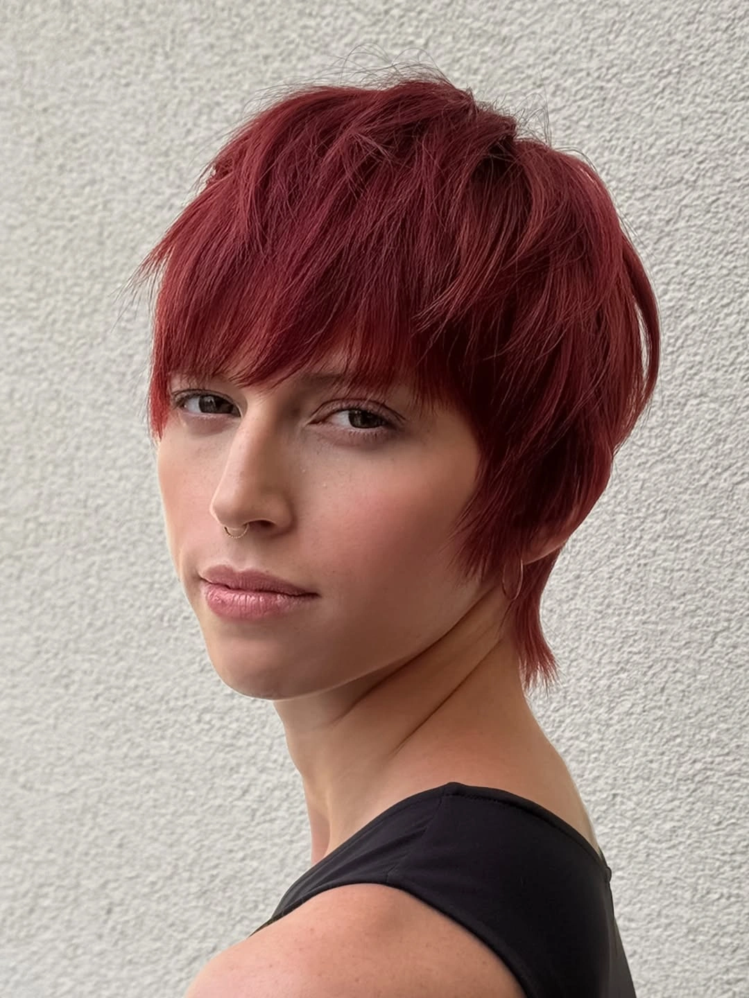 fall pixie haircut ideas 2026 Deep Burgundy Pixie With Feathered Fringe