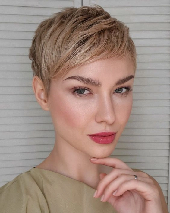fall pixie haircut ideas 2026 Classic Blonde Pixie With Side-Swept Elegance
