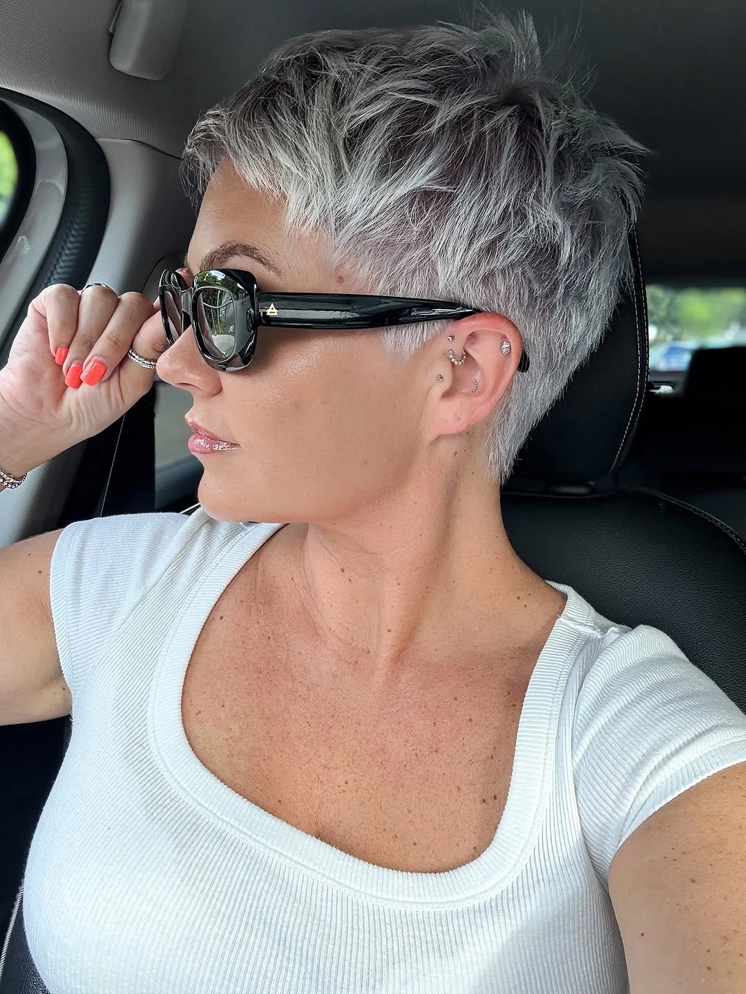 fall pixie haircut ideas 2026 Silver Textured Pixie With Modern Dimension