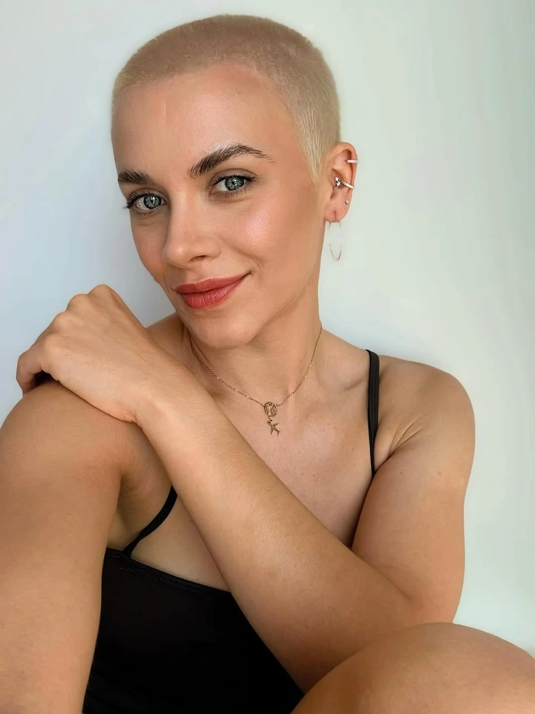 fall pixie haircut ideas 2026 Ultra-Close Buzz Pixie With Soft Blonde Finish