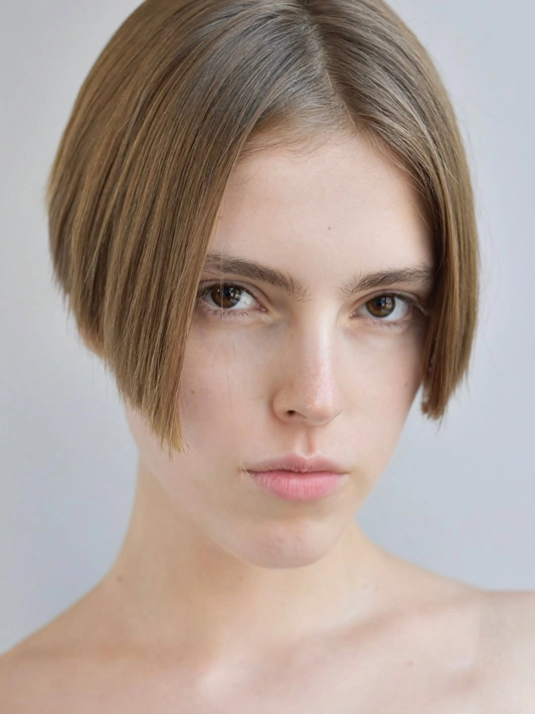 fall short haircuts 2026 Minimalist Precision Bob With Soft Face-Framing Pieces